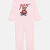 Guess BABY INTERLOCK OVERALL UNISEX - Sleep Suit - Ballet Pink
