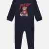 Guess BABY INTERLOCK OVERALL UNISEX - Sleep Suit - Smart Blue