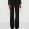 Claire Pintuck Flared Pants - Trousers - Jet Black