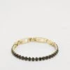 Guess PARADISE - Bracelet - Yellow Gold-coloured/black