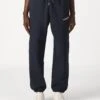 AMERICAN TRADITION JOGGER - Tracksuit Bottoms - Dunkel Blau