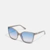 Guess Sunglasses - Shiny Beige / Blu Mirror