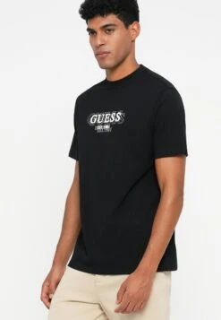 Guess SMALL LOGO TEE - Print T-shirt - Jet Black -Guess Clothing Sale cdea193c6ddd414f9b5e31d0a7e78ab0