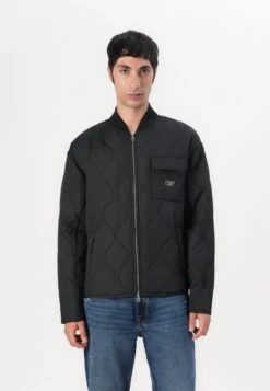 QUILTED PUFFER JACKET - Light Jacket - Jet Black