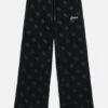 Guess KIDS JUNIOR WIDE LEG PANTS MINI ME - Tracksuit Bottoms - Jet Black