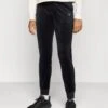 Guess COUTURE JOGGER PANTS - Tracksuit Bottoms - Jet Black