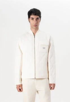 QUILTED PUFFER JACKET - Light Jacket - Pristine White